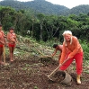 Christina Haverkamp and the Yanomami prepare the building site of the new medical station.